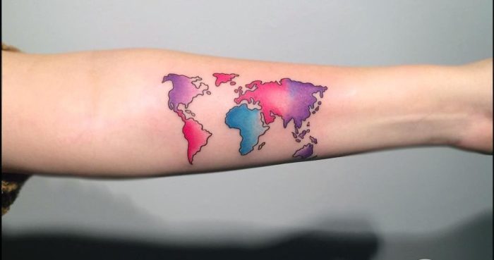 World-Map-Tattoo on a person\'s hand