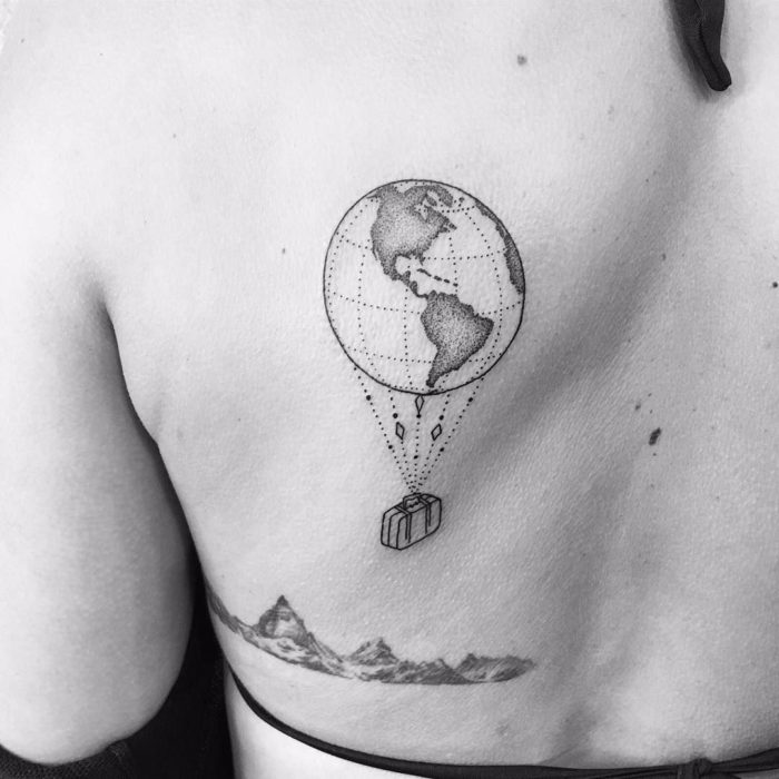 globe tattoo on back