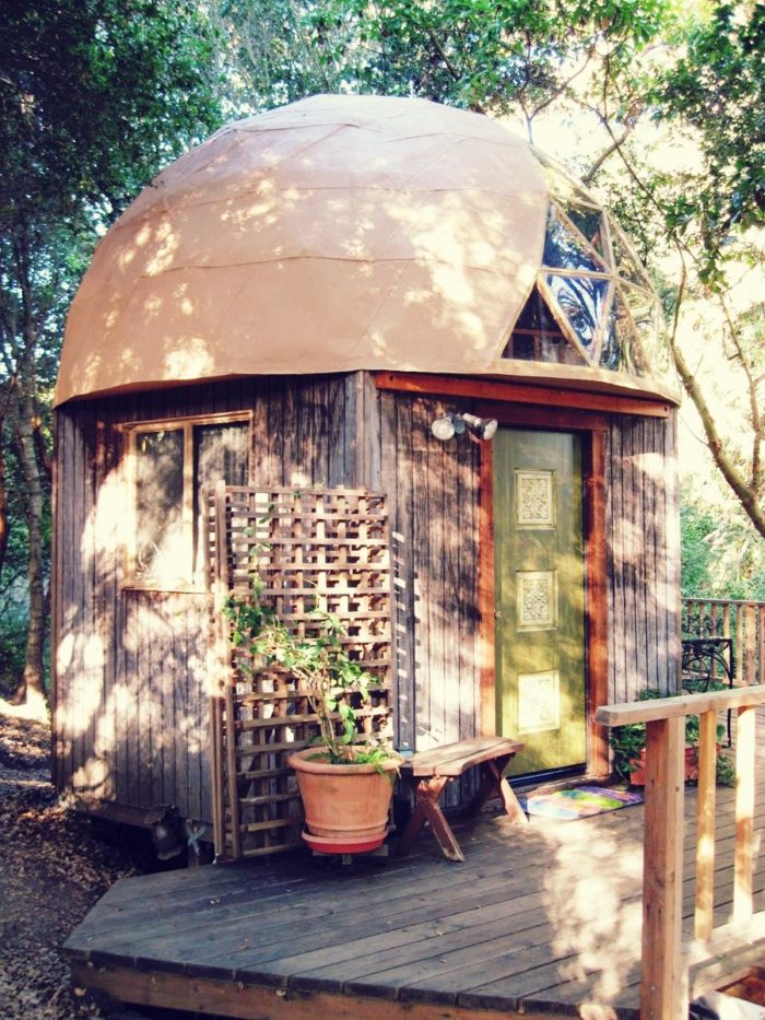 A mushroom dome cabin in the woods