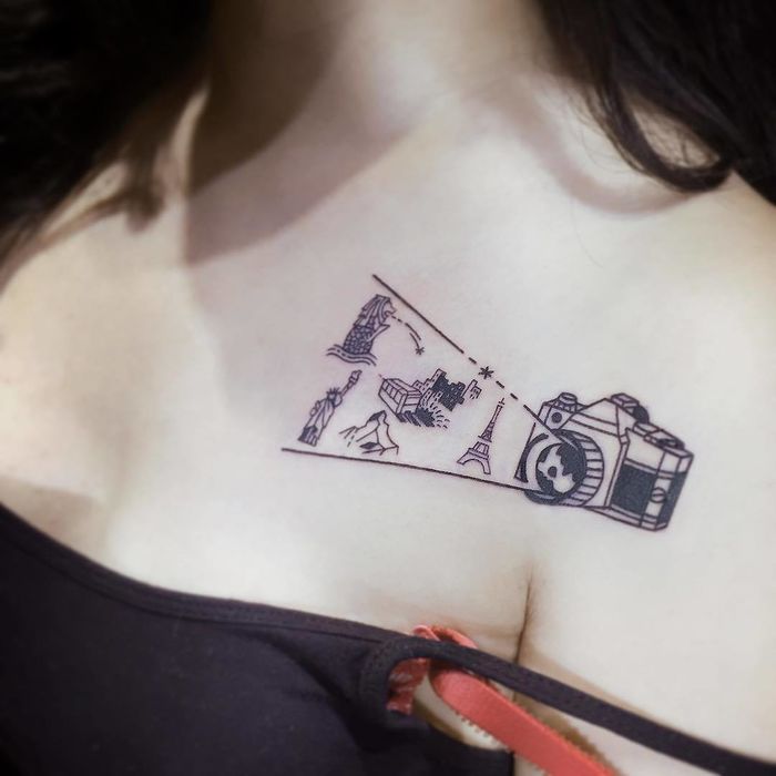 photography travel tattoo on chest