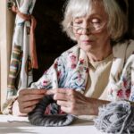 beautiful-grandmother-knitting-a-yarn-